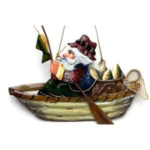 Vintage Metal Christmas Ornament Santa Fishing In A Boat He Caught A Fish